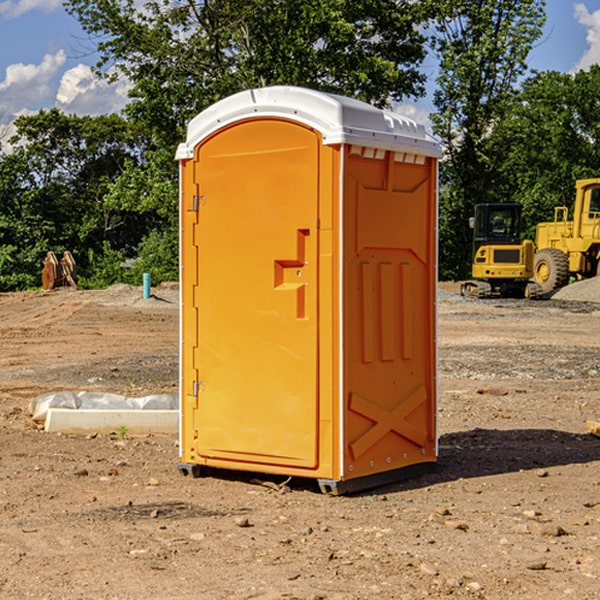 what is the cost difference between standard and deluxe porta potty rentals in Junedale